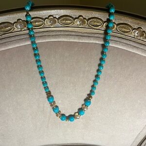 Vintage Turquoise 14” beaded necklace with gold and clear brown bead accents.